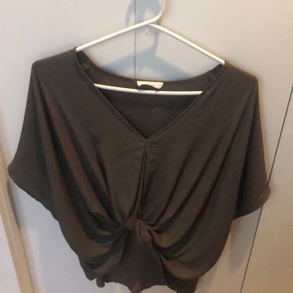Dark green silk top.